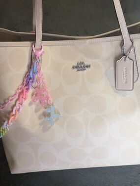 COACH Cream Signature Tote with Pastel Charm and wallet